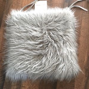 Cushions with strings to attach to chairs